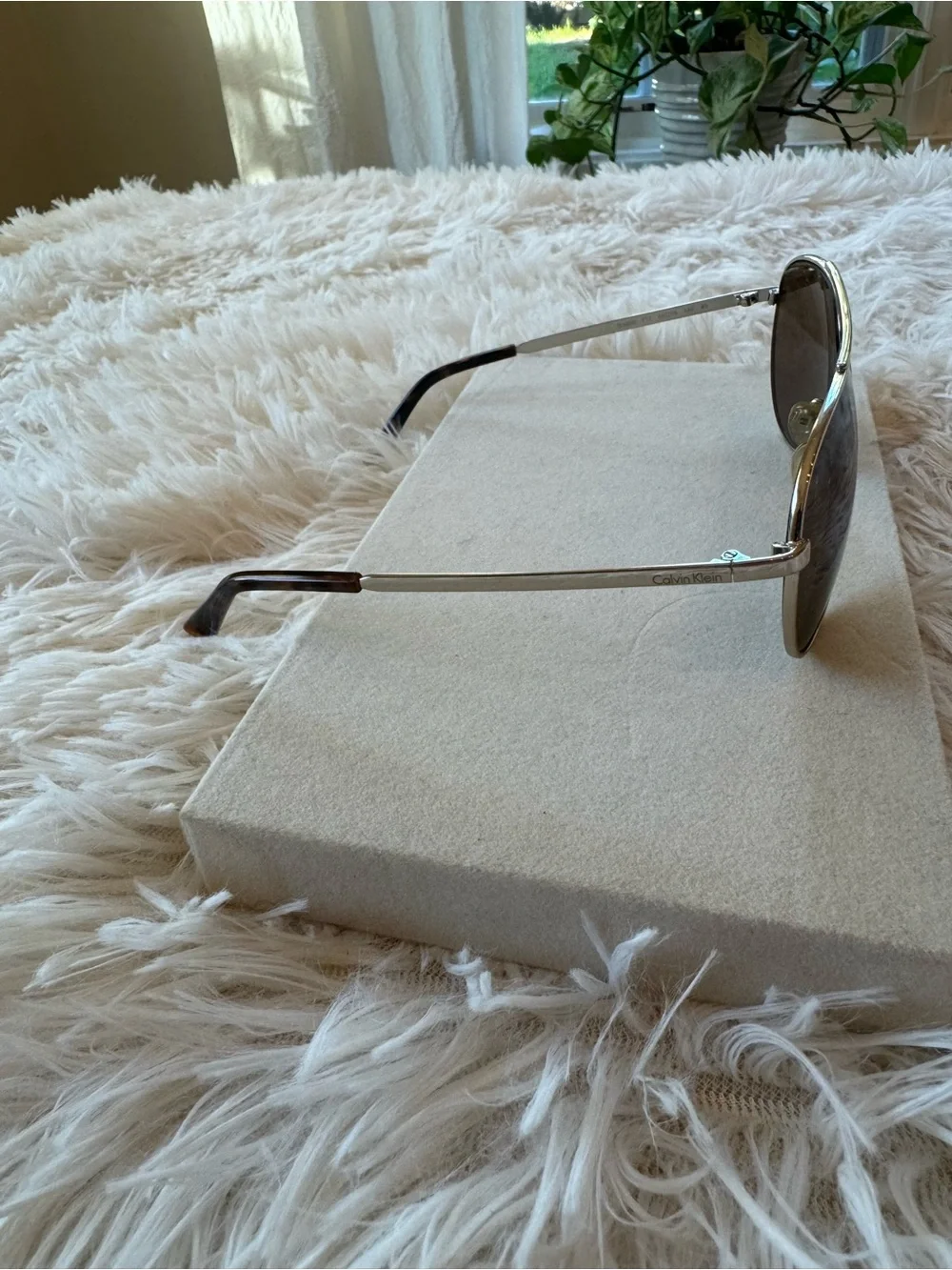 Calvin Klein Gold Unisex Aviator Sunglasses with Brown Lenses